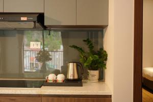 Kuchyň nebo kuchyňský kout v ubytování Jennie's Apartment