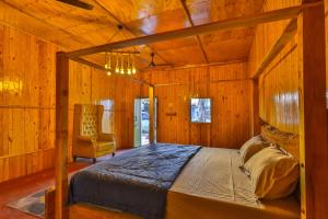 Ένα ή περισσότερα κρεβάτια σε δωμάτιο στο The Buddha Village