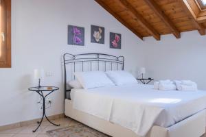 Ένα ή περισσότερα κρεβάτια σε δωμάτιο στο A Casa di Patty