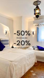 Postel nebo postele na pokoji v ubytování Hotel Al Alba Hammam & Restaurant