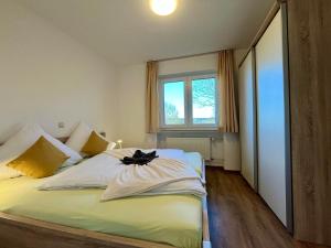 Ένα ή περισσότερα κρεβάτια σε δωμάτιο στο Aparthotel Tannenhof