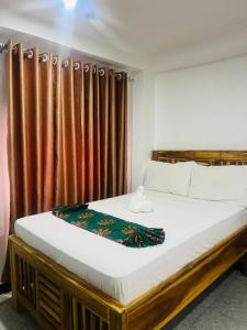 Ένα ή περισσότερα κρεβάτια σε δωμάτιο στο Studio Room