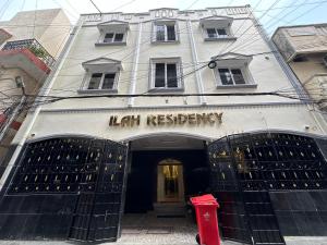 a building with a hell registry sign in front of it at Ilah residency in Chennai