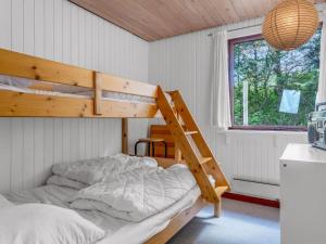 Voodi või voodid majutusasutuse Holiday Home Wenche - 840m from the sea by Interhome toas