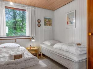 Voodi või voodid majutusasutuse Holiday Home Wenche - 840m from the sea by Interhome toas +19 fotot