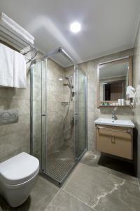 Ванная комната в Regard Hotel