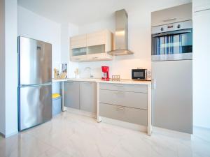 Kuchyň nebo kuchyňský kout v ubytování Apartment Bella by Interhome