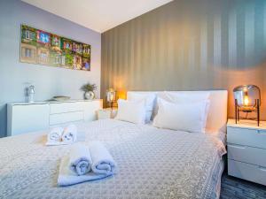 Postel nebo postele na pokoji v ubytování Apartment Bella by Interhome