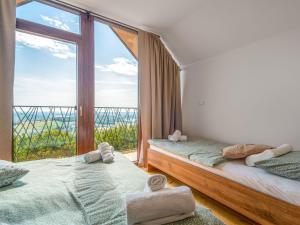 Postel nebo postele na pokoji v ubytování Holiday Home Vila Breg by Interhome