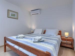 Ένα ή περισσότερα κρεβάτια σε δωμάτιο στο Apartment Marija by Interhome