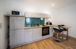 Η κουζίνα ή μικρή κουζίνα στο Le Manon 2