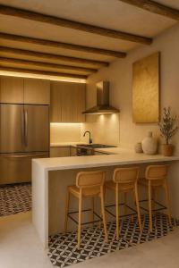 Η κουζίνα ή μικρή κουζίνα στο Casa Rocka Boutique Isla Mujeres