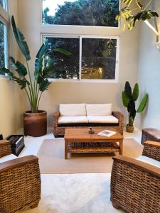 Χώρος καθιστικού στο Casa Rocka Boutique Isla Mujeres