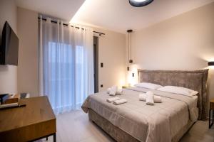 Giường trong phòng chung tại Villa Ammos +32 ảnh