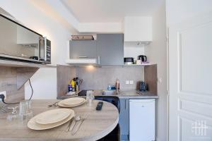 Kuchyň nebo kuchyňský kout v ubytování Studio Five - Hyper centre - Proche gare - 2V + 6 fotografií