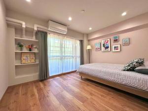 Ένα ή περισσότερα κρεβάτια σε δωμάτιο στο Aa歌舞伎町 东京最中心 东新宿四分钟