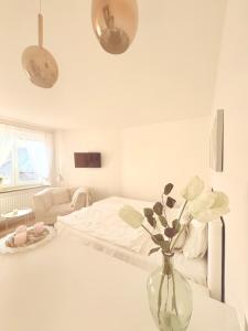 Postel nebo postele na pokoji v ubytování Trio Apartments