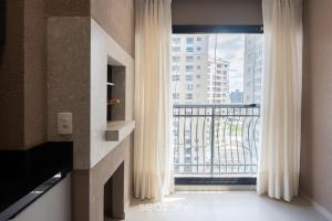 Μια τηλεόραση ή/και κέντρο ψυχαγωγίας στο Apartamentos Completos a 700m da Praia - VNV