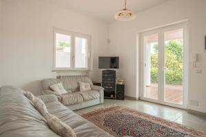 Et opholdsområde på Villetta San Leone con giardino