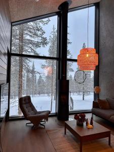 Villa Arctic Trail, Apartment A - Aurora view hot tube - Sauna - Lapland holiday v zimě