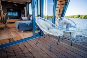 Μπαλκόνι ή βεράντα στο Hausboot Brino Woma D13