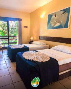 Postel nebo postele na pokoji v ubytování Porto Zarpa Hotel + 54 fotografií