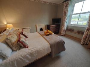 En eller flere senge i et værelse på 2 Bed in Sedbergh oc-m33975