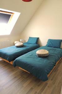 Ένα ή περισσότερα κρεβάτια σε δωμάτιο στο Agapanthe bleue