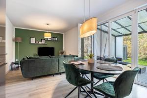 TV a/nebo společenská místnost v ubytování Altenbeken-Ferienwohnung 2