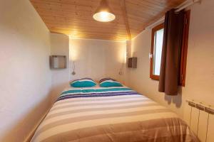 En eller flere senge i et værelse på charmante maisonnette & jardin non clos proche forêt