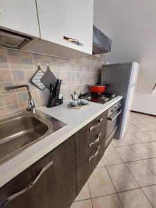 Kuchyň nebo kuchyňský kout v ubytování Il Vagabondo + 2 fotografie