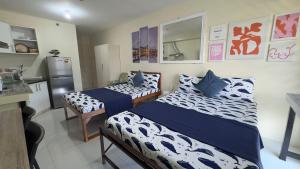 Kuchyň nebo kuchyňský kout v ubytování Affordable Ayala Avida IT Park Condo across Ayala Mall Central Bloc Sugbu Mercado + 9 fotografií