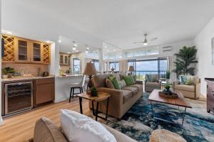 a living room with a couch and a kitchen at Kapalua Ridge Villas 1612 · KRV 1612 Remodeled Kapalua Villa w O in Kahana