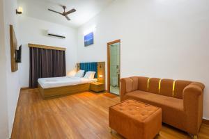 Postel nebo postele na pokoji v ubytování Palm Tree Villa