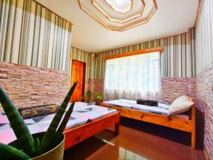 Postel nebo postele na pokoji v ubytování Town Proper Staycation in Sagada