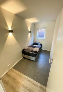 Postel nebo postele na pokoji v ubytování 78-4 - Luxe appartement met havenuitzicht