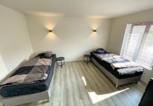 Postel nebo postele na pokoji v ubytování 78-4 - Luxe appartement met havenuitzicht