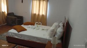 Ένα ή περισσότερα κρεβάτια σε δωμάτιο στο Pensão restauração horizonte