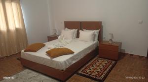 Ένα ή περισσότερα κρεβάτια σε δωμάτιο στο Pensão restauração horizonte