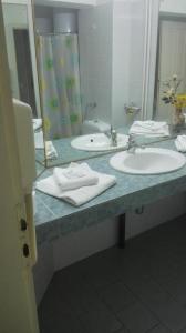 Vonios kambarys apgyvendinimo įstaigoje Family Hotel Rositsa