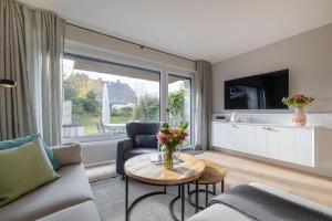 TV a/nebo společenská místnost v ubytování Süder16