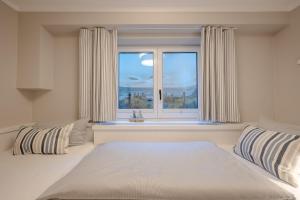 Postel nebo postele na pokoji v ubytování Süder16