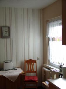 Ένα ή περισσότερα κρεβάτια σε δωμάτιο στο Uns Oellernhuus