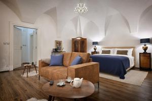 Ένα ή περισσότερα κρεβάτια σε δωμάτιο στο Hotel U Šuterů