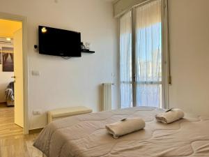 Ένα ή περισσότερα κρεβάτια σε δωμάτιο στο Alabastro 40