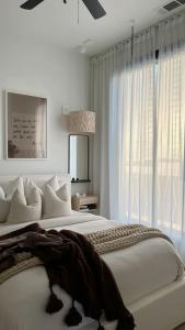 Postel nebo postele na pokoji v ubytování Appartement chic a Douala derrière hôpital général