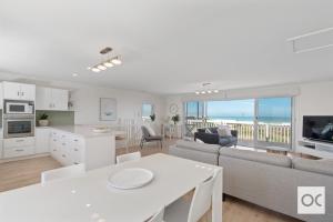 a living room with a couch and a table at Amazing Views in Middleton