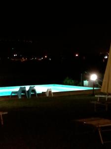 The swimming pool at or close to Il Gallo Del Vicino