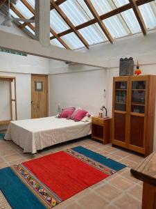 Ένα ή περισσότερα κρεβάτια σε δωμάτιο στο Casa Kata