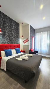 Postel nebo postele na pokoji v ubytování Hostal Lauria